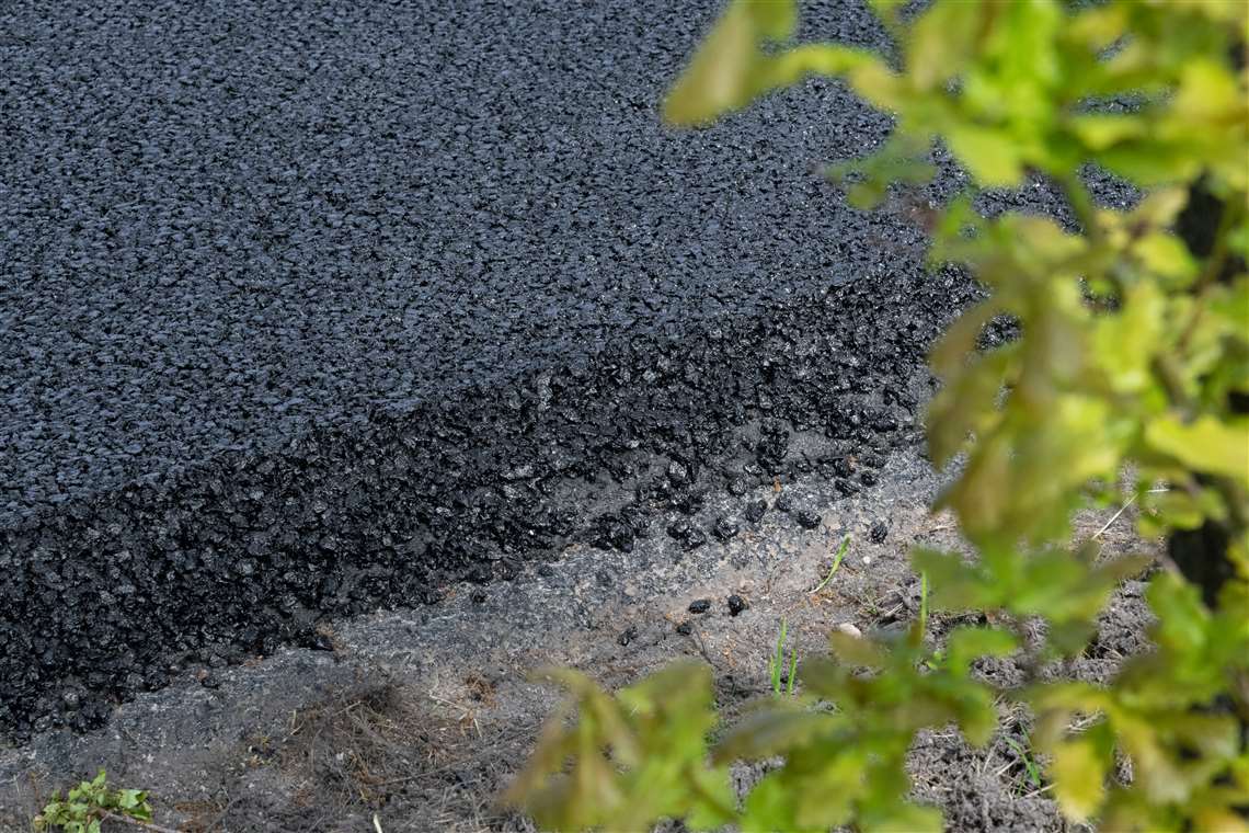 The Roelofs team onsite laying the bio-asphalt 