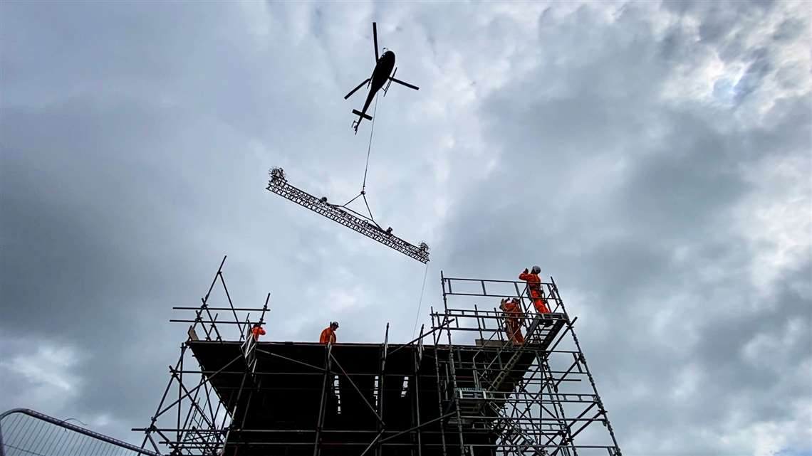 Helicopter hovering above Cowburn Tunnel ventilation shaft