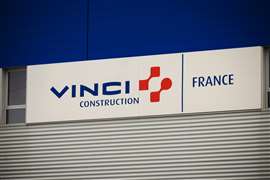 Vinci Construction France sign on the side of a building.