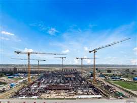 Five Potain brand cranes work the site of the future Noida International Airport in India. (Image: Manitowoc)