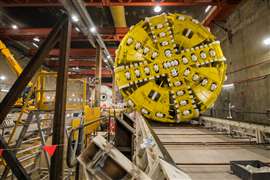 A yellow TBM cutter head underground for use on the Metro Tunnel Project in Australia.