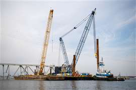 Cranes help to dismantle collapsed Baltimore bridge
