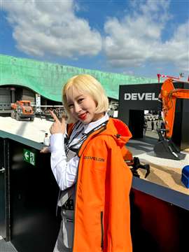 K-Pop start Dayoung is a brand ambassador for Develon AND a qualified excavator operator