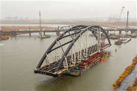 The first of three arches is delivered and installed on Skanska USA/Traylor Bros' Portal North Bridge project