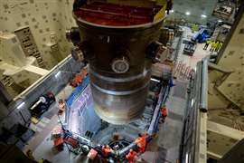 Installation of the first of two reactor pressure vessels at Hinkley Point C nuclear power plant in Somerset, England.
