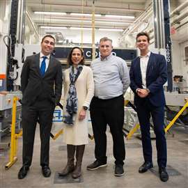 Dr Iris Rivero, second from left, with the recently installed COBD BOD3 3D concrete printer (Image: UF Herbert Wertheim College of Engineering)