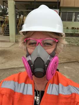 Joanna Oliver at a gold mine in the Atacama desert. She recalls how an interpreter had sorted the PPE and offered her a pink hi-vis vest "as I was a lady". She adds, "I refused to wear it!"