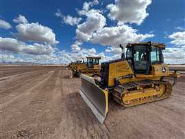Lineup of Deere dozers at the John Deere facility in Arizona, US (Image: Mitchell Keller)