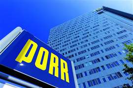 Une photo du siège social de Porr à Vienne, avec le logo Porr bleu et jaune au premier plan