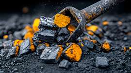 Close up macro shot of crushed cement clinker fragments and particles before being ground into a fine powder for use in concrete and construction materials.