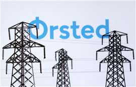 Electric power transmission pylon miniatures and Orsted logo are seen in this illustration taken, December 9, 2022. REUTERS/Dado Ruvic/Illustration/File Photo