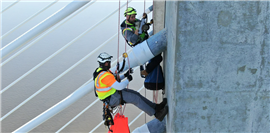 A WSP bridge inspection team uses ropes to perform a manual inspection (Image: WSP)