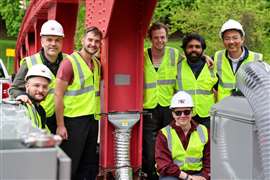 Members of the UMass Amherst and MIT Department of Mechanical Engineering research team, led by Simos Gerasimidis (left, standing) with the 3D printed patch. (Image: MIT)