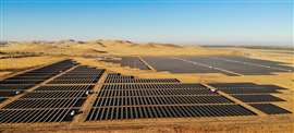 Solar panels in a desert setting; California, US. Image: Adobe Stock