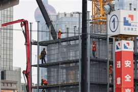 Bauarbeiter arbeiten auf einer Baustelle in Shanghai, China. (Bild: Reuters/Go Nakamura)