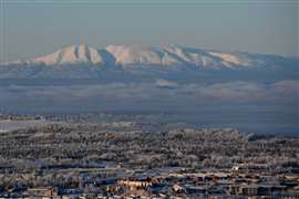 Mount Susitna rises above US armed force's Joint Base Elmendorf-Richardson in Alaska, US. Image: Adobe Stock