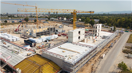 Bau des Grünen Depots in Mannheim. Für den Bau wurde ein Materialmix aus Hybridholzprodukten, Gulam und Beton verwendet. Bild: Strabag