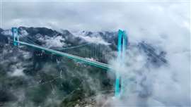 The Huajiang Canyon Bridge in China