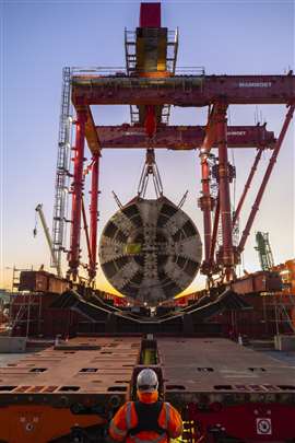 Mammoet designed a bespoke gantry system with a capacity of 900 tonnes to life four tunnel boring machines out of a shaft above underground tunnels for the HS2 high-speed railway in the UK. Mammoet extracted the TBMs from the Green Park Way vent shaft, 35m above the twin tunnels, on a difficult site on the outskirts of London that sits near two live railways. Collaborating with contractor Skanska Costain Strabag JV and TBM manufacturer Herrenknecht, Mammoet extracted the front and middle sections of each TBM in a single lift and placed them onto SPMTs, transporting them to a disassembly area on site. Design of the system took nine months and each of the four lifts took 24 hours. (Image courtesy of Mammoet).