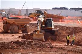 Construction equipment in operation during the building of the gargangtuan Stargate data centre in north Abilene, Texas, USA. The 1,100 acre facility is the flagship site among a series of new data centre developments for ChatGPT creator. Over 6,400 construction workers are involved in its construction, which is scheduled for completion in mid-2026. (Image: USA TODAY Network via Reuters Connect).