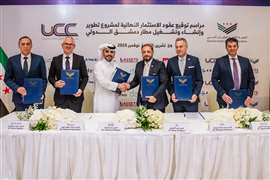 Delegates from the consortium signing the deal with the Syrian Civil Aviation Authority. (Photo: UCC Holding)