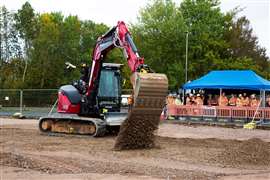 An excavator fitted with Gravis Robotics technology operates on a Taylor Woodrow construction site in the UK (Image courtesy of Taylor Woodrow)