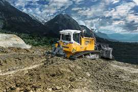 A Liebherr PR 736 G8 dozer at work with a mountainous backdrop. Liebherr says that operator comfort is at the centre of every development. (Image: Liebherr)