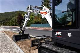 A Bobcat E16 excavator working on a road project