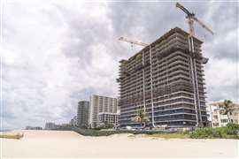 How is the high-rise industry advancing sustainability and tech?