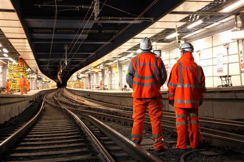 Two engineers on a railway track