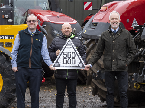 Stephen Howarth AEA, Kevin Howells Datatag and Dave Luscombe CEA celebrate the 500,000th machine fitted with CESAR