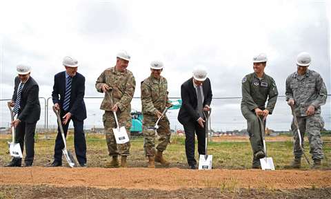 General Jeffrey L. Harrigian, U.S. Air Forces in Europe and Air Forces Africa commander, (center), poses for a photo with 48th Fighter Wing personnel and local civic leaders, partners and contractors during an F-35 groundbreaking ceremony at RAF Lakenheath, UK, July 15, 2019. U.S. Air Force photo by Airman 1st Class Shanice Williams-Jones