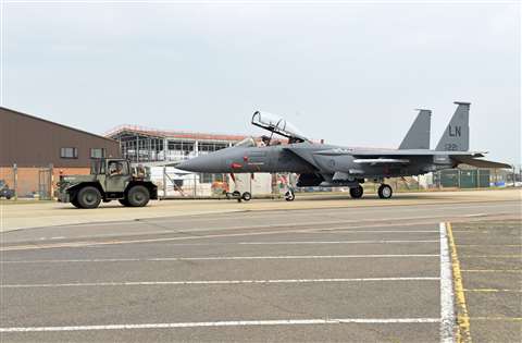 An F-15E Strike Eagle assigned to the 48th Fighter Wing is moved to the newly expanded parking ramp at RAF LakenheathU.S. Air Force photo by Airman 1st Class Rhonda Smith