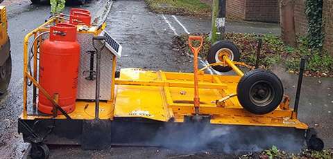 VolkerHighways infrared road repair machine at work