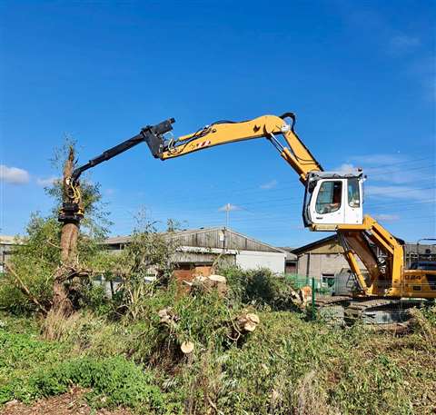 A Liebherr high-reach material handler in operation