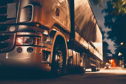 A truck driving on a motorway