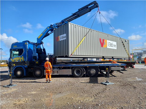 An iStore on-site container is delivered to site