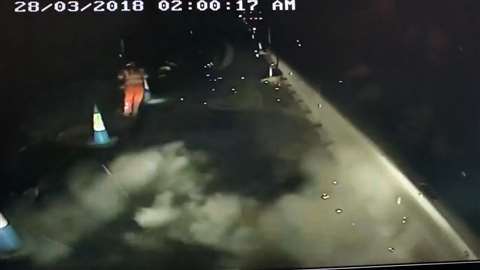 A worker runs after a machine strikes a power line on the M6 motorway in the UK (Image courtesy of HSE)