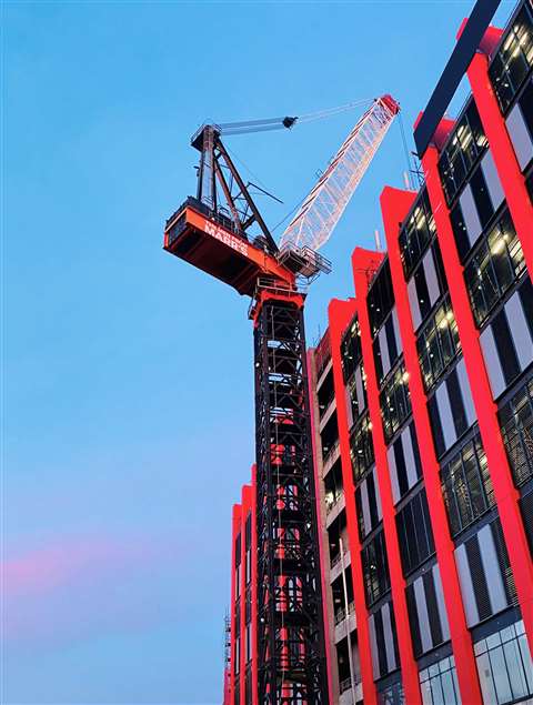 a big Marr Favco luffing jib tower crane at work on a data centre construction job