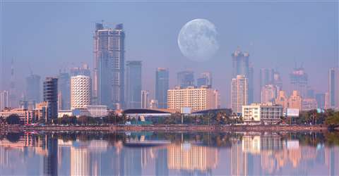 The skyline of Mumbai in India at night. Mumbai is key to India's construction industry.