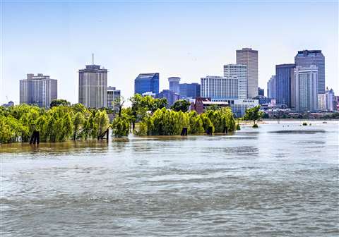 Flooded Mississippi with New Orleans skyline