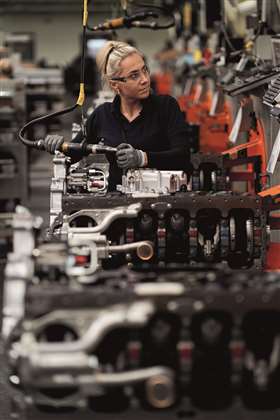 At Perkins, assembly line tools are programmed to complete specific tasks