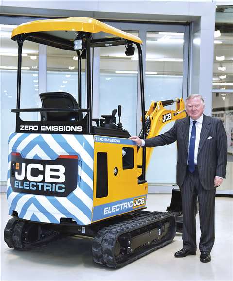 JCB Chairman Lord Bamford with an Electric 2 digger