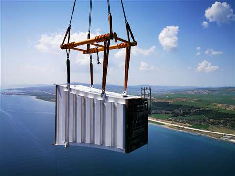 The 155 tonne section of the UCB (upper connecting beam) being lifting into position onto the bridge towers 318 metres above sea level