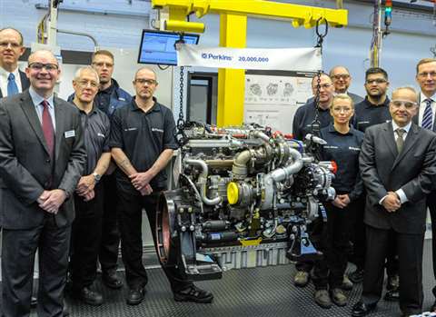 Perkins president Ramin Younessi (front right) joins representatives from across the business to cel