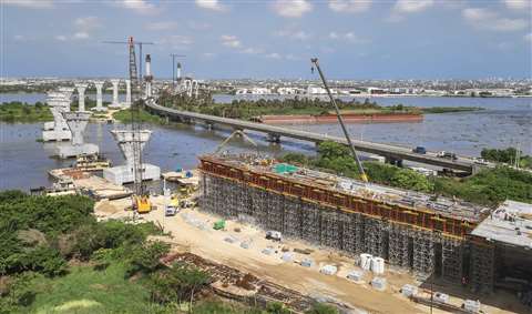 New Pumarejo Bridge under construction alongside the older bridge in Barranquilla, Colombia
