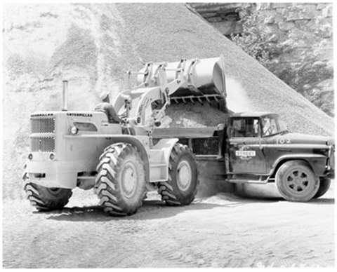 Caterpillar's first production wheeled loader was the 944, first manufactured in 1959.