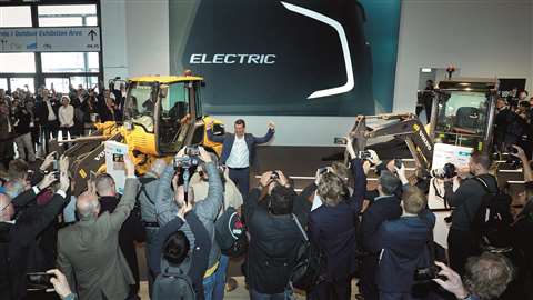 Melker Jernberg celebrates the unveiling of Volvo CE’s electric compact excavator and wheeled loader at its Bauma launch