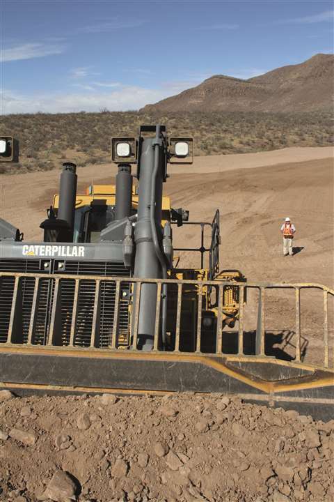 A Caterpillar mining dozer being operated by remote control