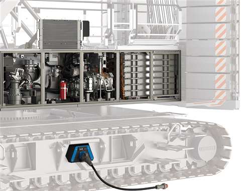 The left side of the machine showing the battery pack towards the rear, with the main drive motor and pumps ahead of it. Standing at the front of the compartment is the slewing motor